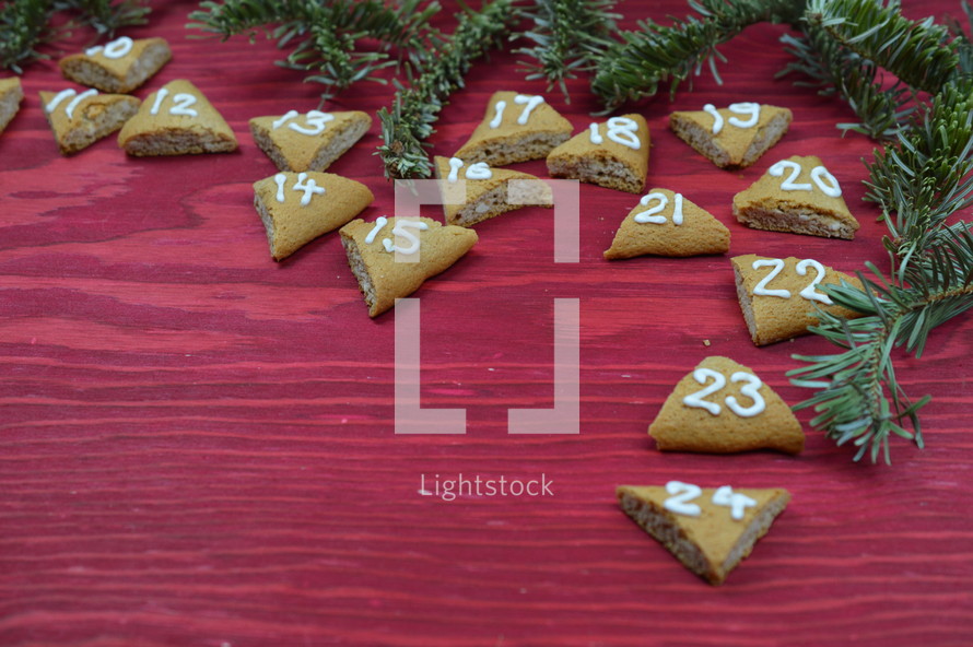 advent cookies on red wood 