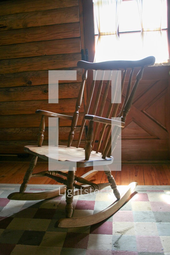 rocking chair inside a cabin 