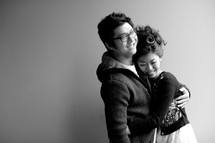 Asian couple hugging 