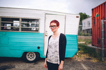 motorhome and woman with a pixie haircut 