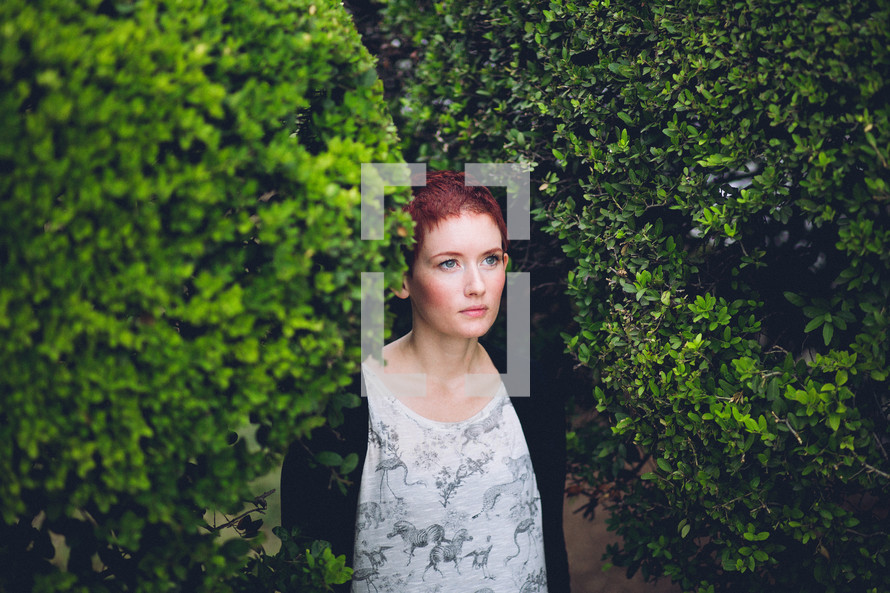 woman standing in a garden 
