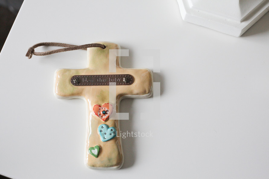 A cross for a baby. Bless this baby.