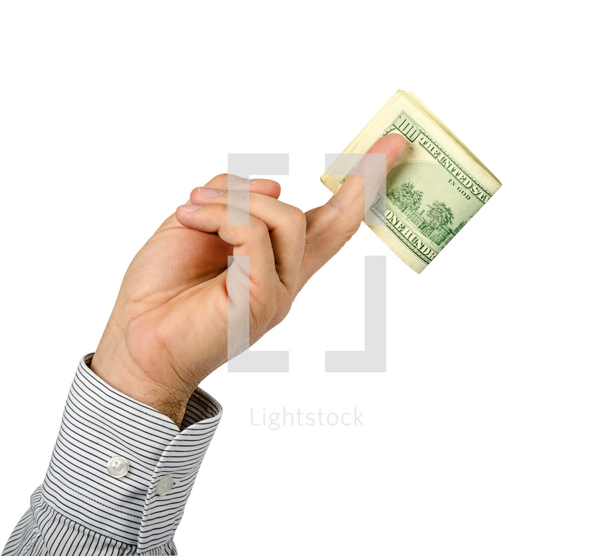 Extended hand holding a folded stack of hundred dollar bills.