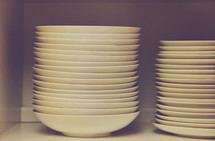 stacks of white dishes