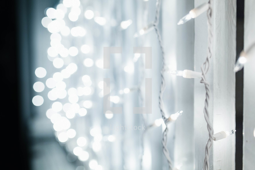 hanging strands of Christmas lights 
