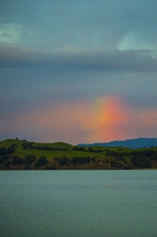 rainbow over islands 