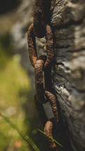 rusty chain on wood 