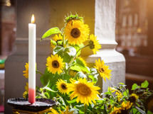 church sunflowers and candle 