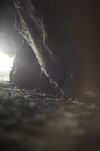 light at the entrance of a cave 