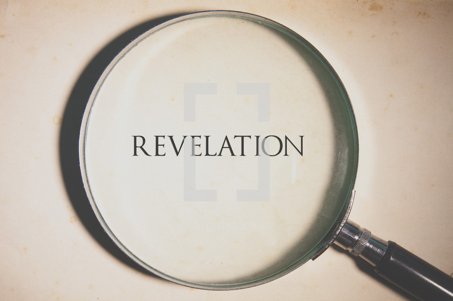 magnifying glass over Revelation 
