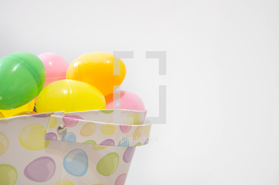plastic Easter eggs in a bucket 