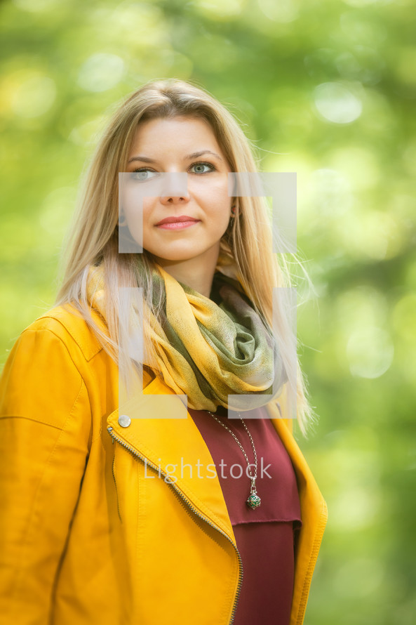 portrait of a young woman in fall 