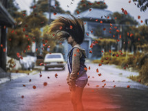 falling rose petals and a woman flipping her hair 