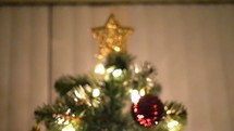 star at the top of a Christmas tree