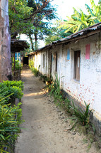 dirty alley between two buildings in Nepal 