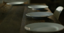 plates on a dining room table 