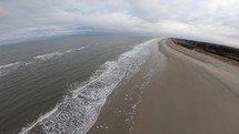 Cloudyday on the beach of Langeoog Island, In Germany - aerial 