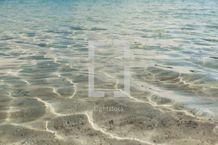 Clear Shallow Ocean Water And Sandy Ocean Floor Photo Lightstock