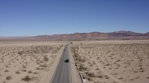 Drone over desert road