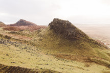 green peaks and slopes in Scottish landscape 