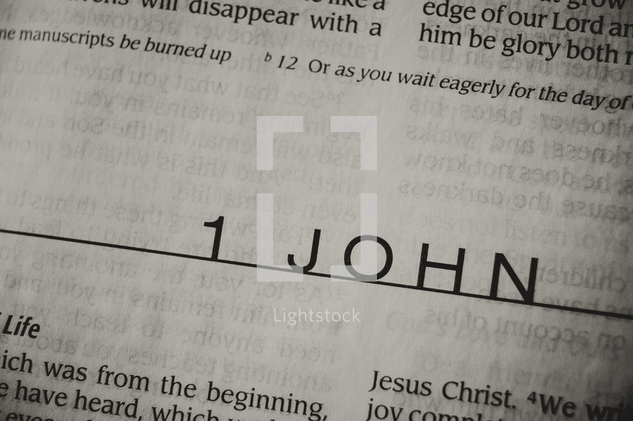 Open Bible in book of I John
