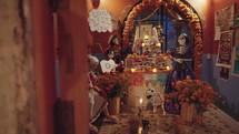 Day of The Dead Dia de los Muertos Ofrenda Altar Display Decoration with Sugar Skull Calavera and Marigolds Oaxaca, Mexico