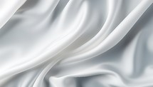 Closeup of rippled white silk fabric cloth lines.