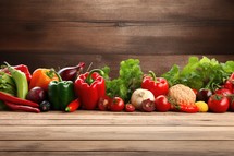 Fresh vegetables on wooden table. Healthy food background with space for text