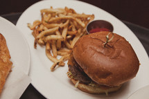Hamburger and french fries on a plate