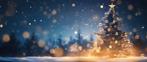 Christmas tree in the snow with golden stars and bokeh background