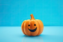 Halloween pumpkin on a blue background. 3d render illustration.