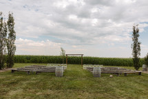 Wedding ceremony set up near corn field