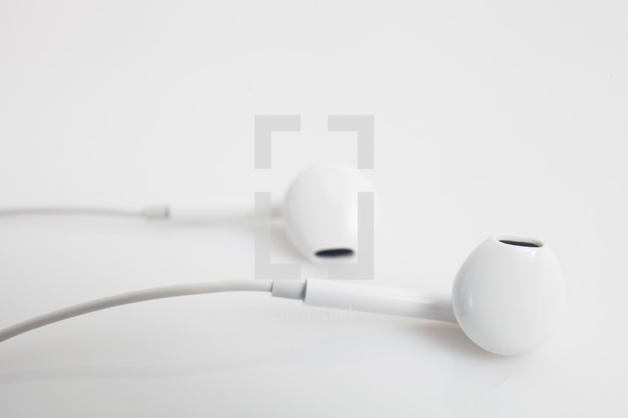earbuds on white 