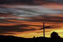 sunset over a cross