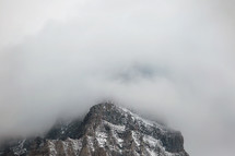 clouds hide the mountain peak