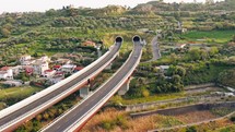 Cars pass on the highway viaduct