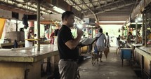 Preaching the gospel in the market in the Philippines