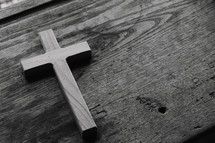 cross on wood desk 