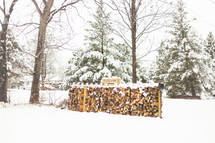 firewood in snow 
