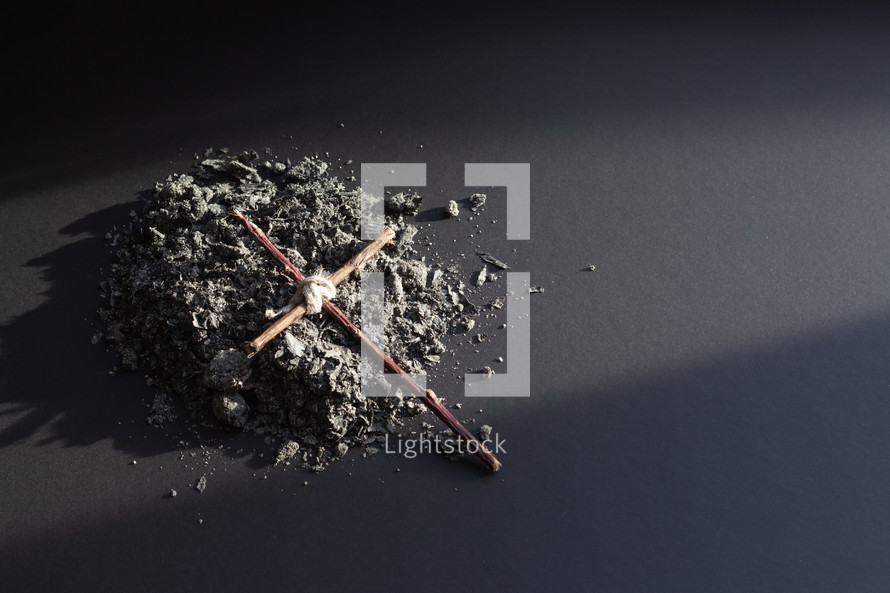 cross on a pile of ashes 