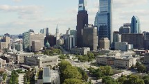 Aerial view of Philadelphia urban skyline day time. Flying over downtown philadelphia near city hall drone shot 4k	