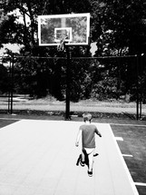 toddler on a basketball court 