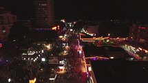 drone flying over a city at night 