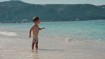 Little boy on the shore