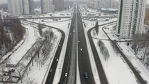 Car traffic on highway junction in winter city