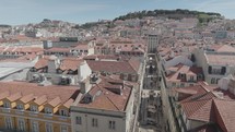 View of Baixa and Praca Dom Pedro IV from top of Elevador de Santa Justa Lift in Lisbon, Portugal