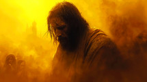 Close-up portrait of Jesus Christ with long black hair and beard in a yellow smoke.