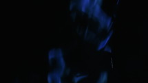  Blue gas flames on black background