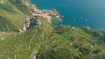 aerial view over a coastline and resort 