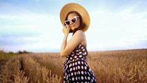 Portrait of woman in wheat field